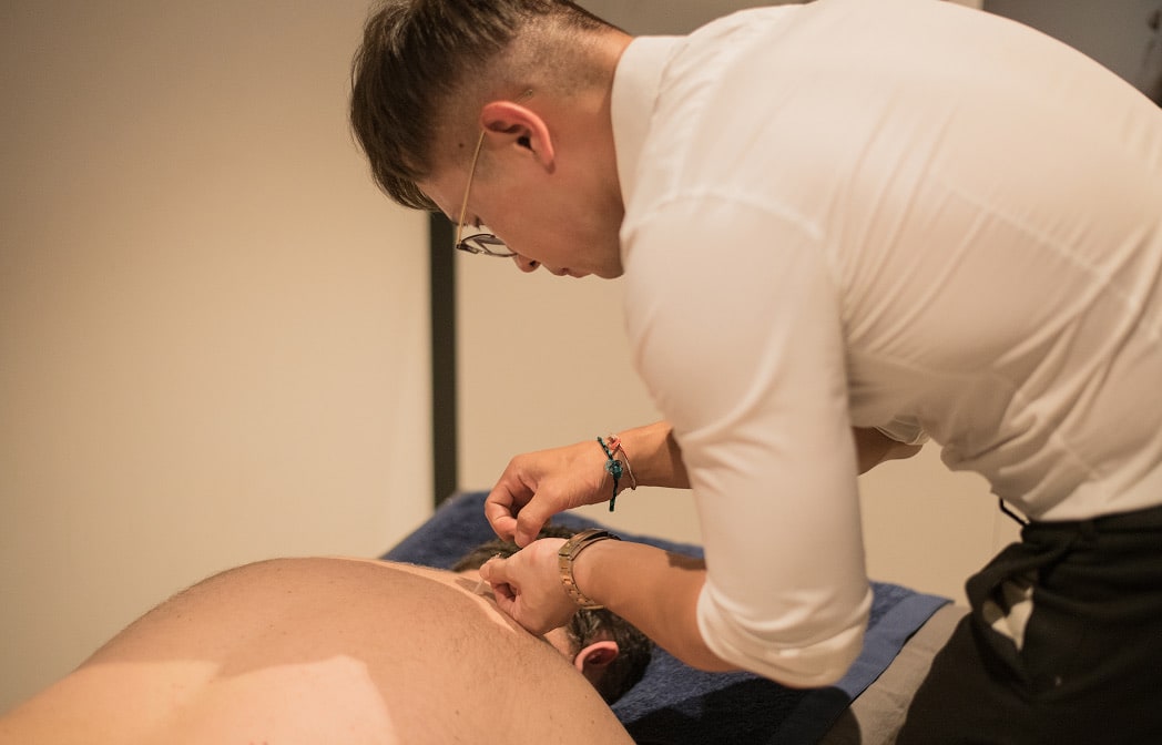 Practitioner examining patient